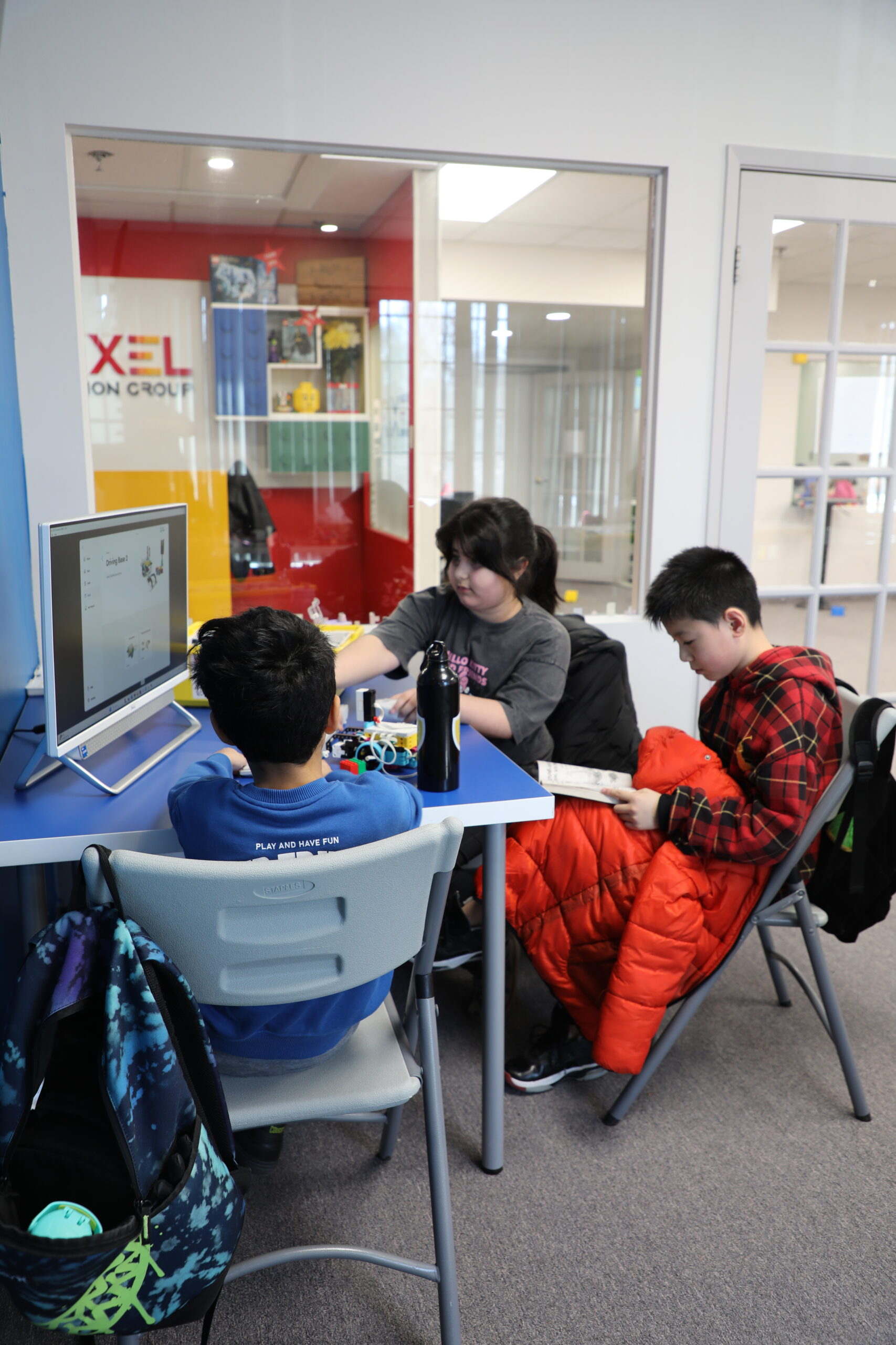 Kids exploring coding and technology through hands-on learning